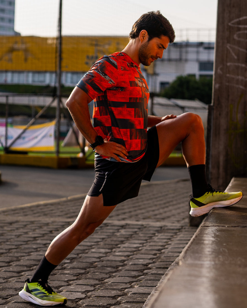 Corredor con Jersey Running Ultimate naranja para hombre, vista lateral completa