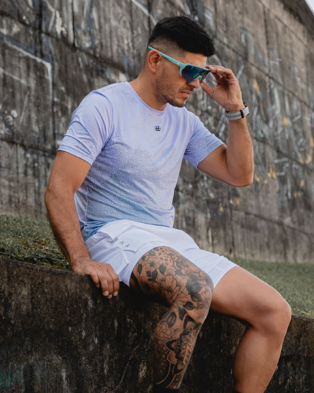 Pantaloneta Running Momentum blanca para hombre, vista lateral